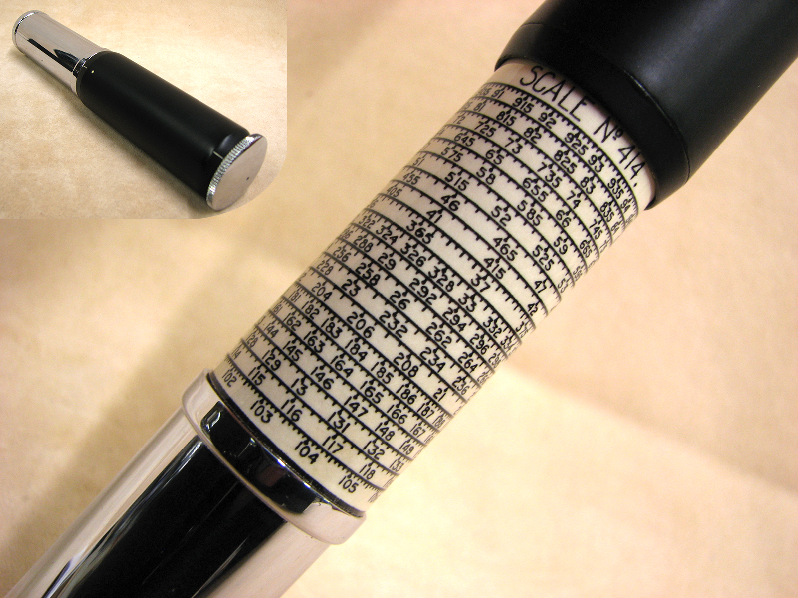 Early 1970's Otis King Model K type C leather cased cylindrical slide rule calculator